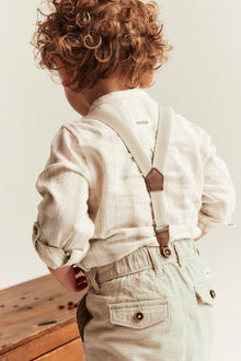 Baby beige woven trousers with suspenders