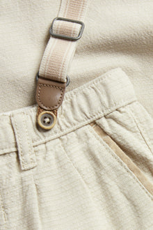 Kids beige woven trousers with suspenders