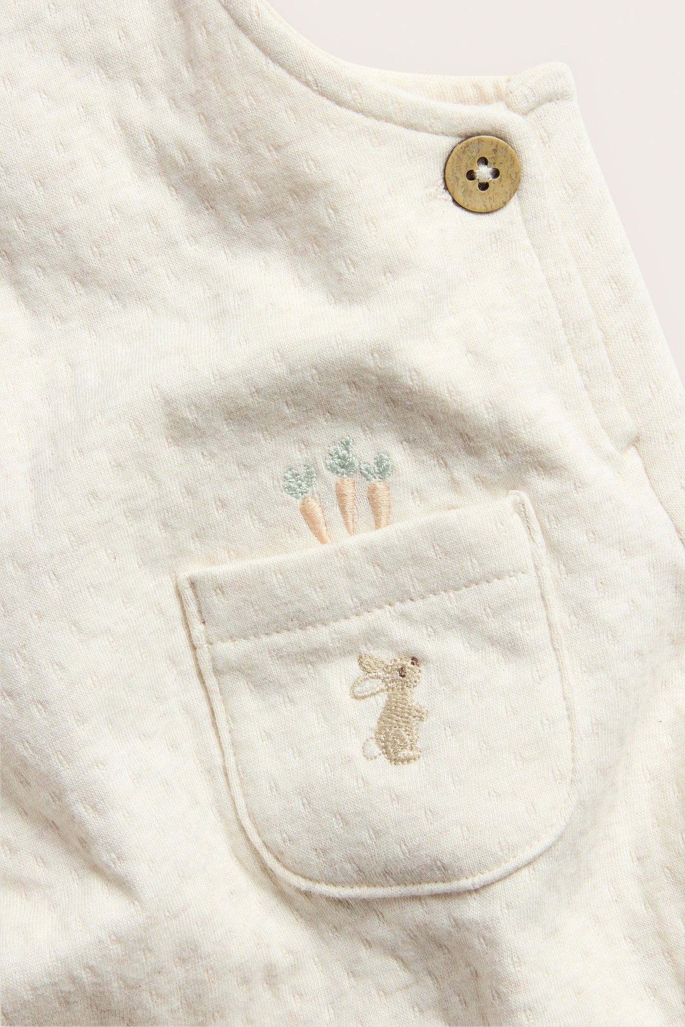 Baby beige jersey dungarees with front pocket