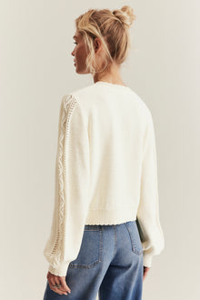 Women's white knitted cardigan with flowers