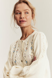 Women's white knitted cardigan with flowers