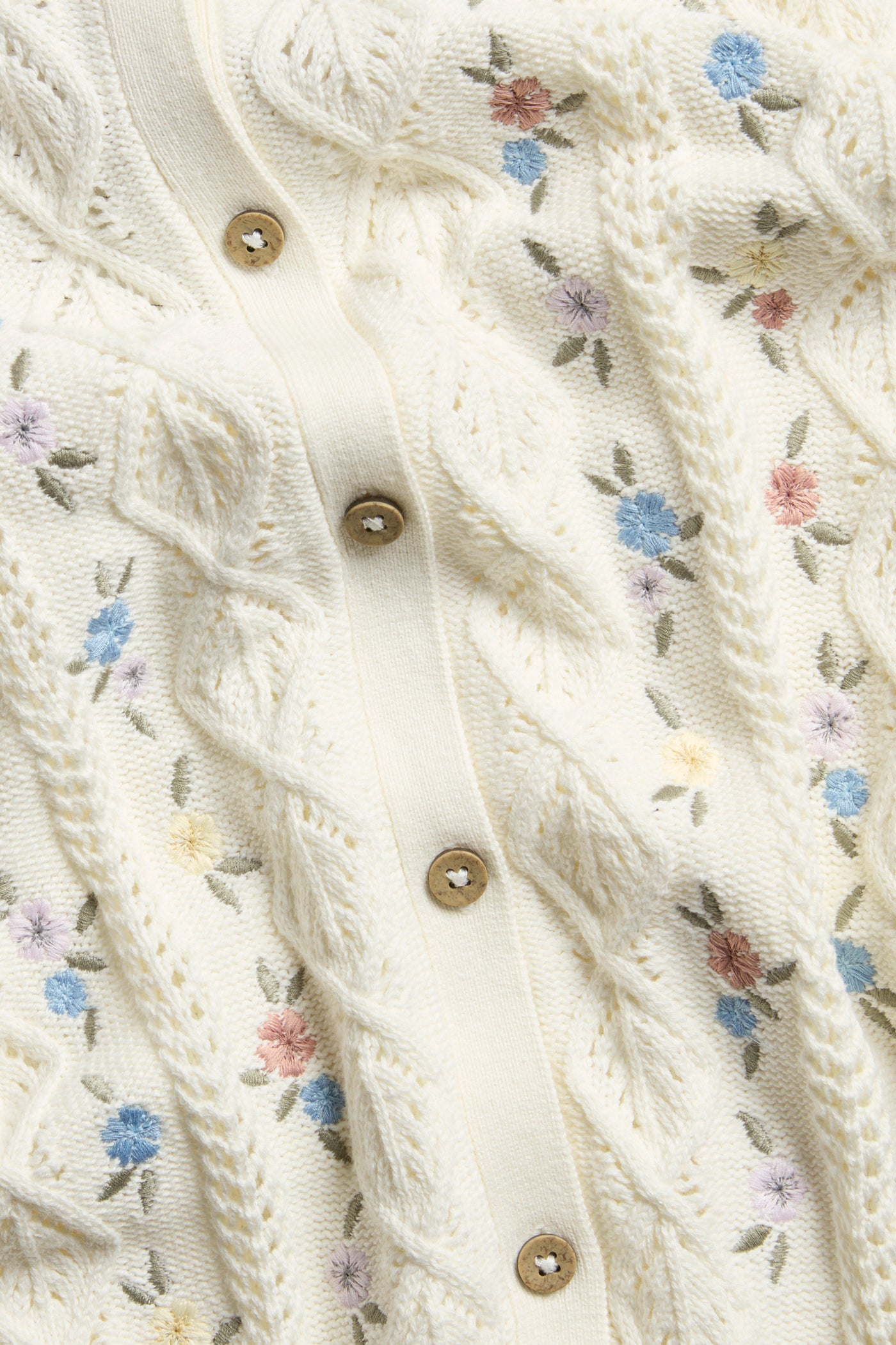 Women's white knitted cardigan with flowers
