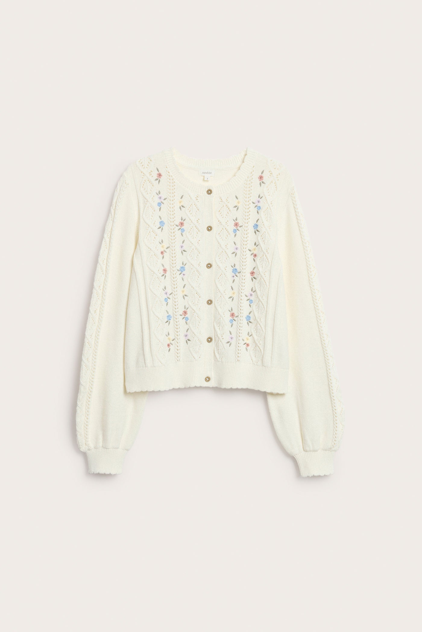 Women's white knitted cardigan with flowers