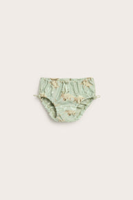 Baby green swim bottoms with dinosaur print