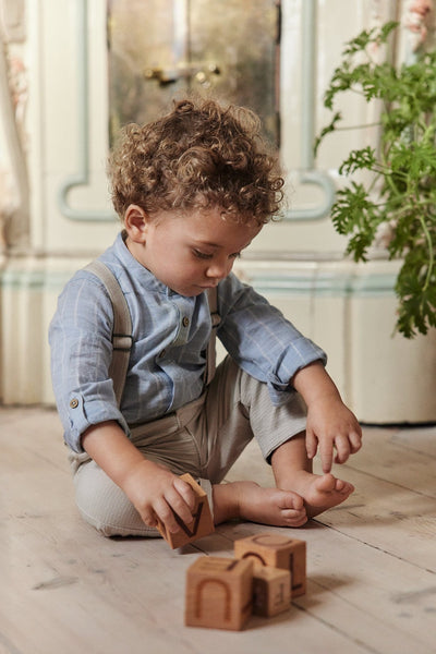 Baby blue striped shirt‑style bodysuit