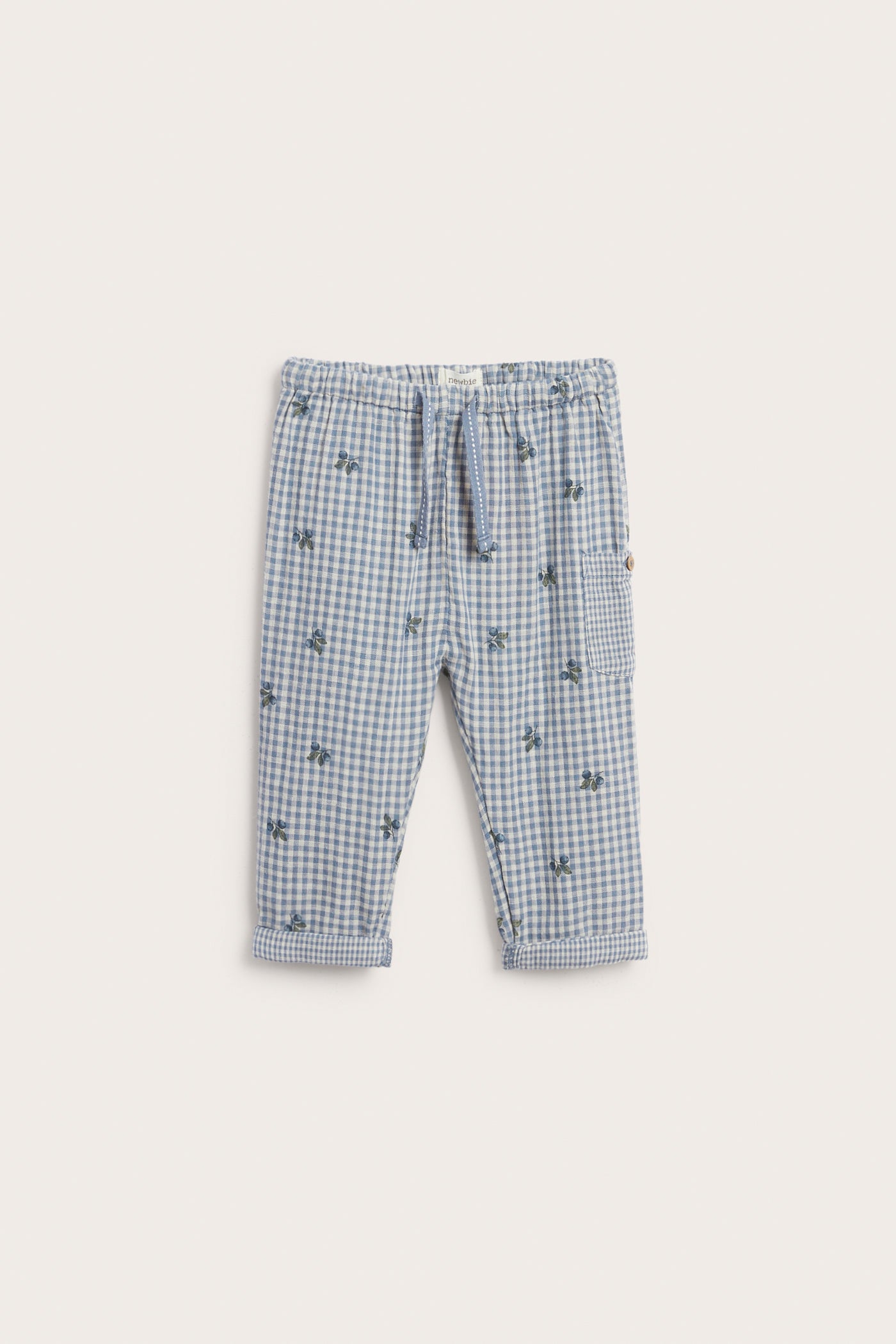 Baby blue checked trousers with blueberries