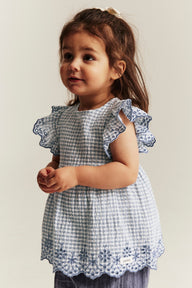 Baby checked bodysuit with frills and embroidery