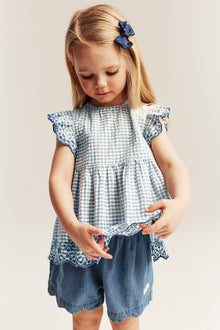 Kids peplum blouse with embroidery
