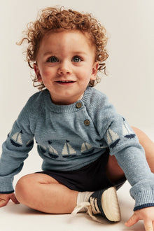 Baby knitted sweater with sailboats