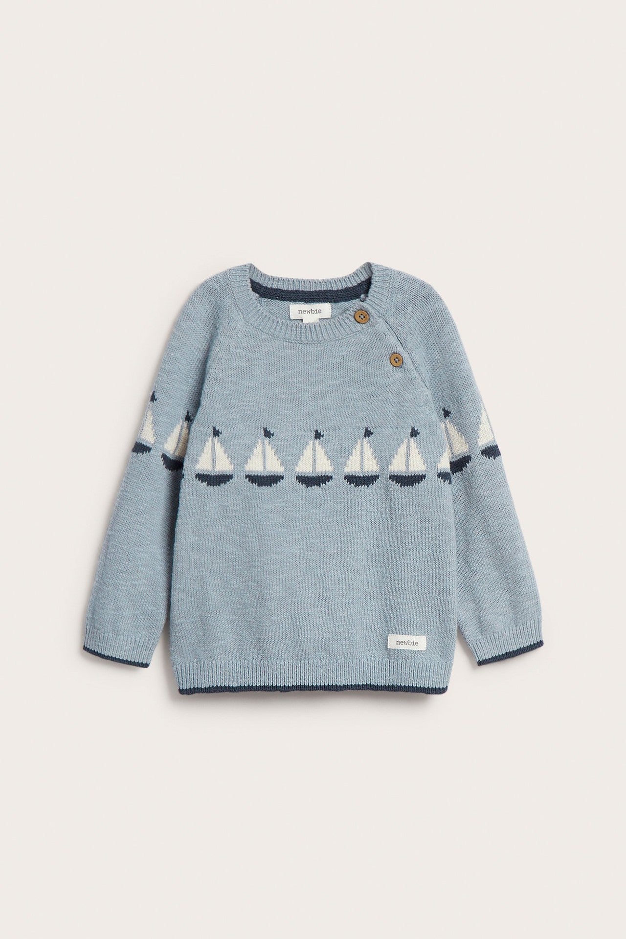 Baby knitted sweater with sailboats