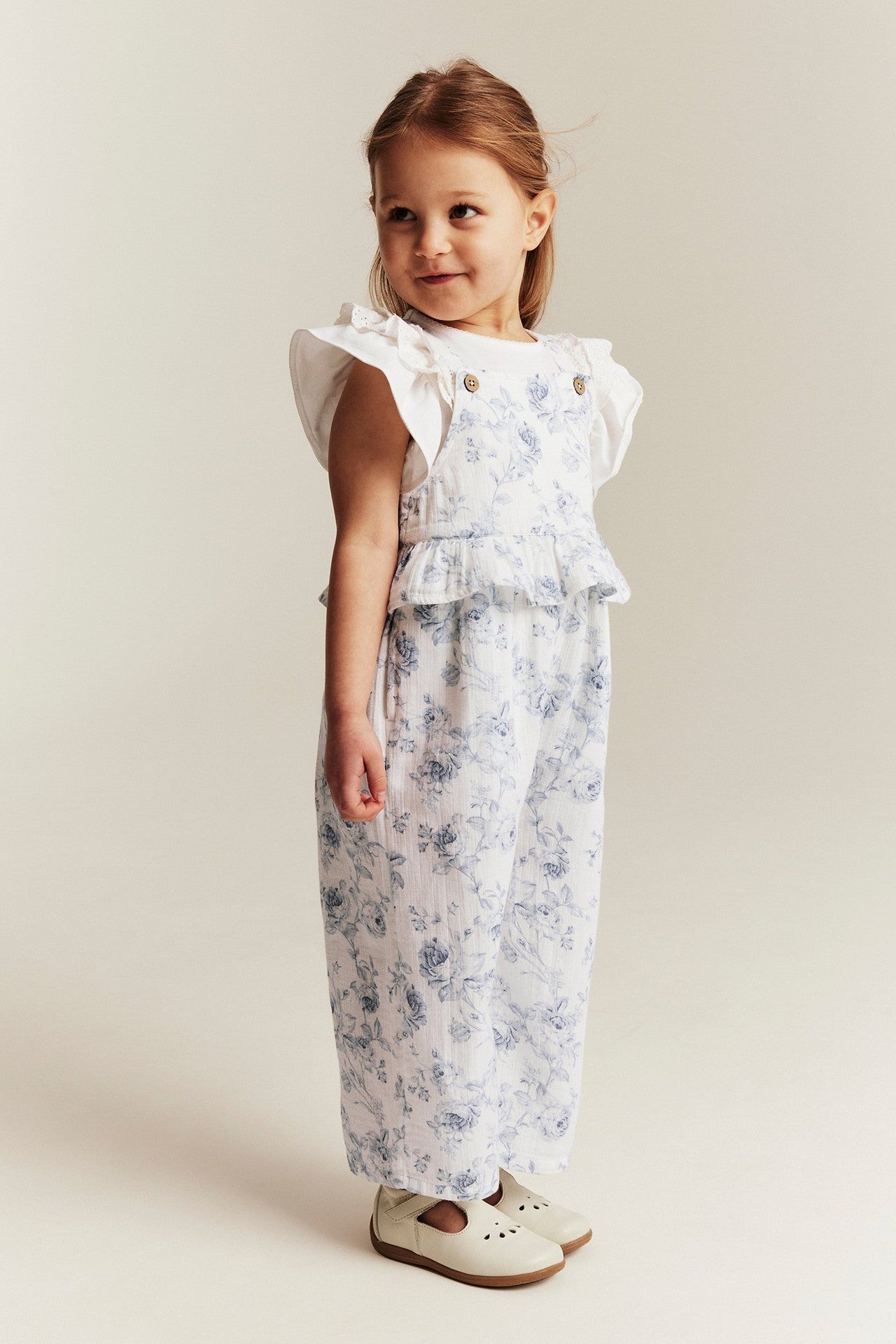 Kids floral jumpsuit with frill
