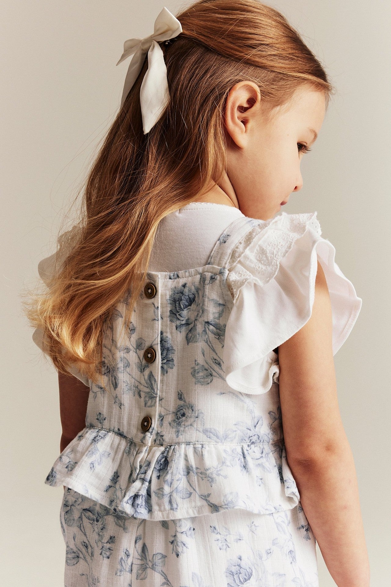 Kids floral jumpsuit with frill