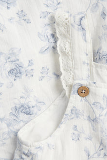 Kids floral jumpsuit with frill