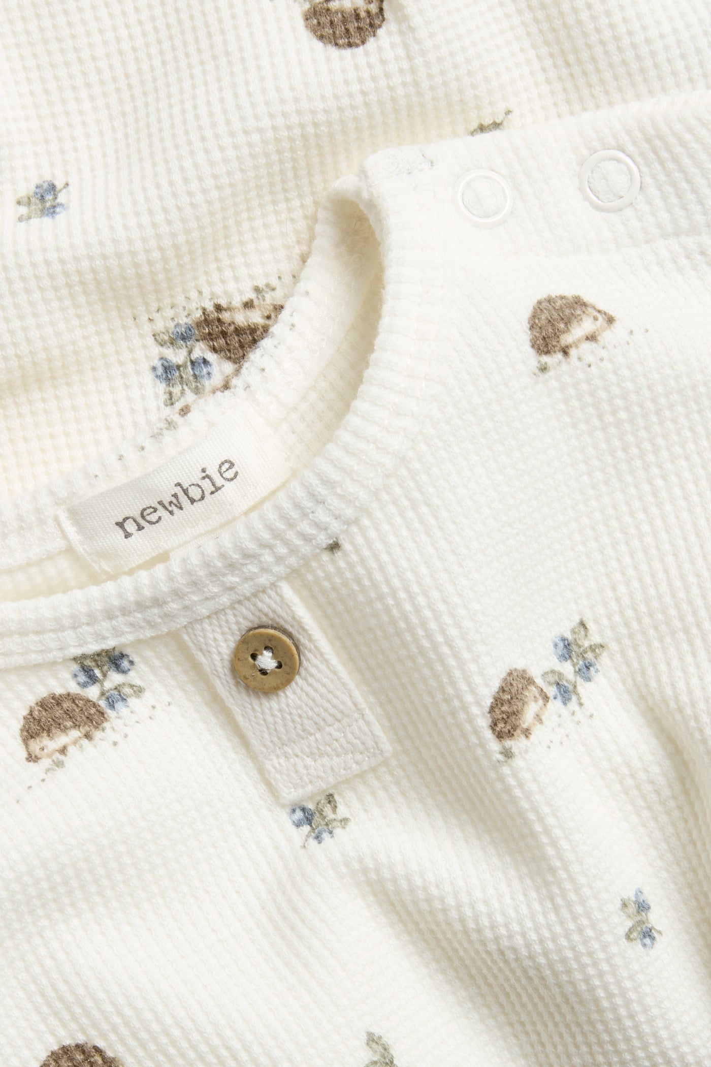Baby white hedgehog-patterned bodysuit