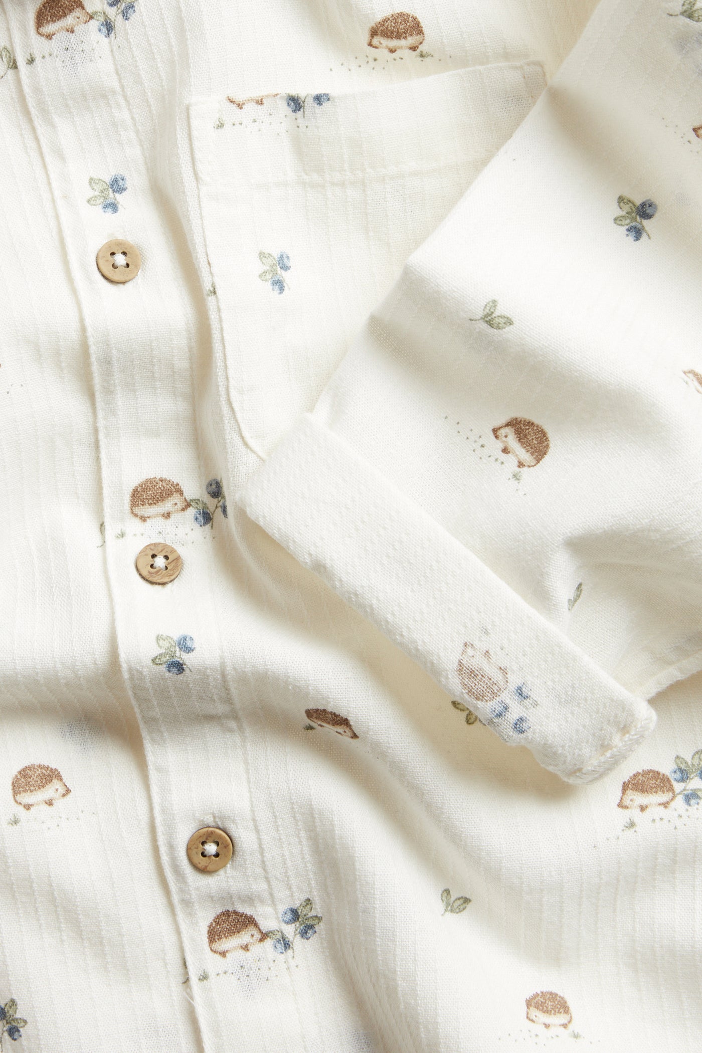 Kids’ white shirt with hedgehog pattern