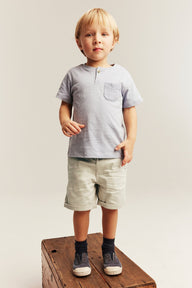 Kids beige woven shorts with pockets