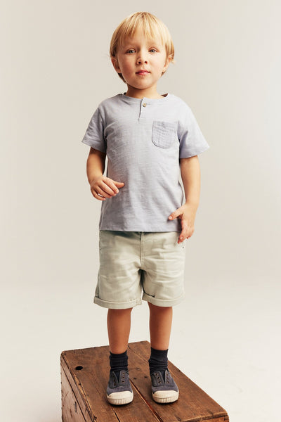 Kids beige woven shorts with pockets