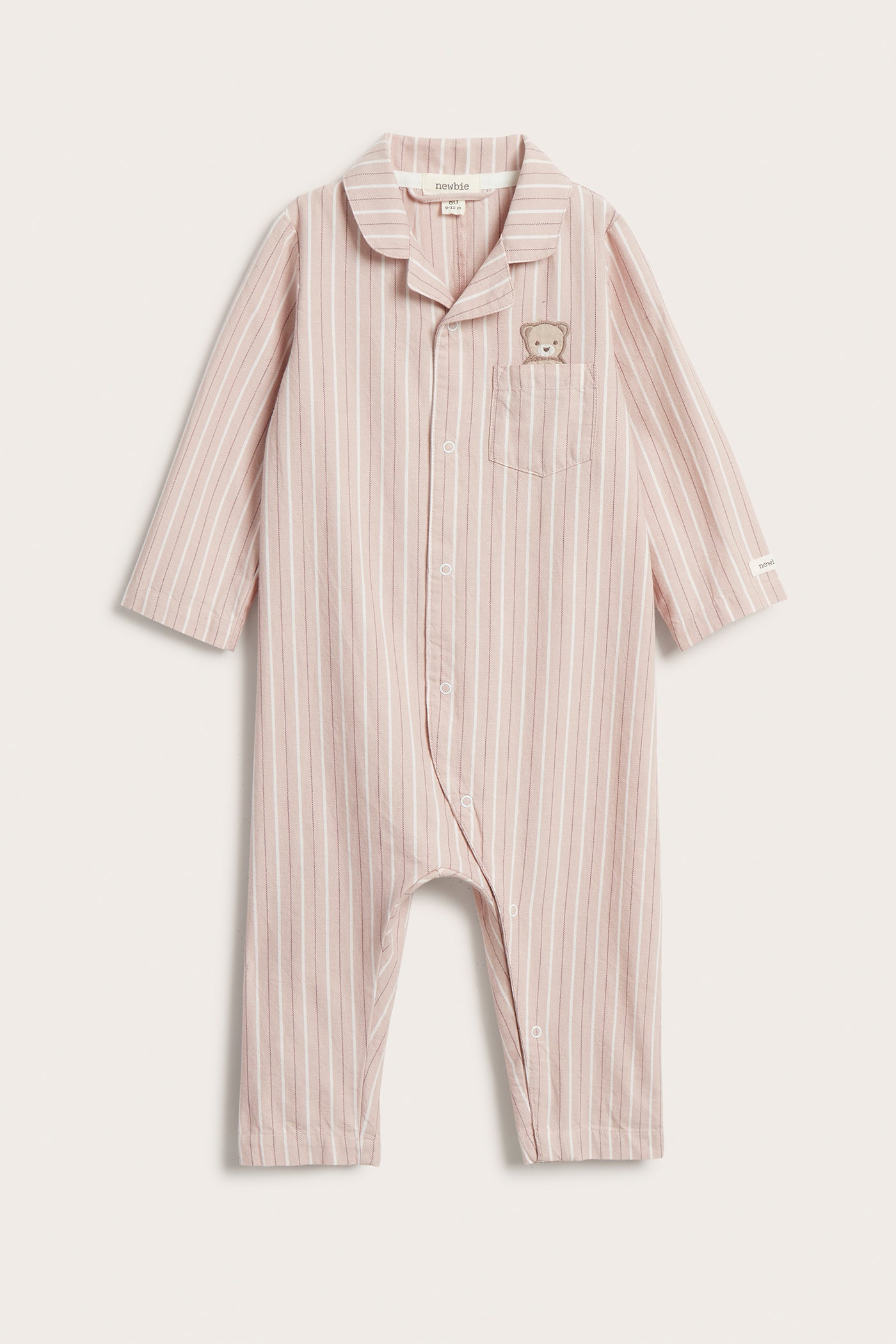Baby pink striped sleepsuit with teddy bear