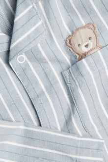 Baby blue striped sleepsuit with teddy bear