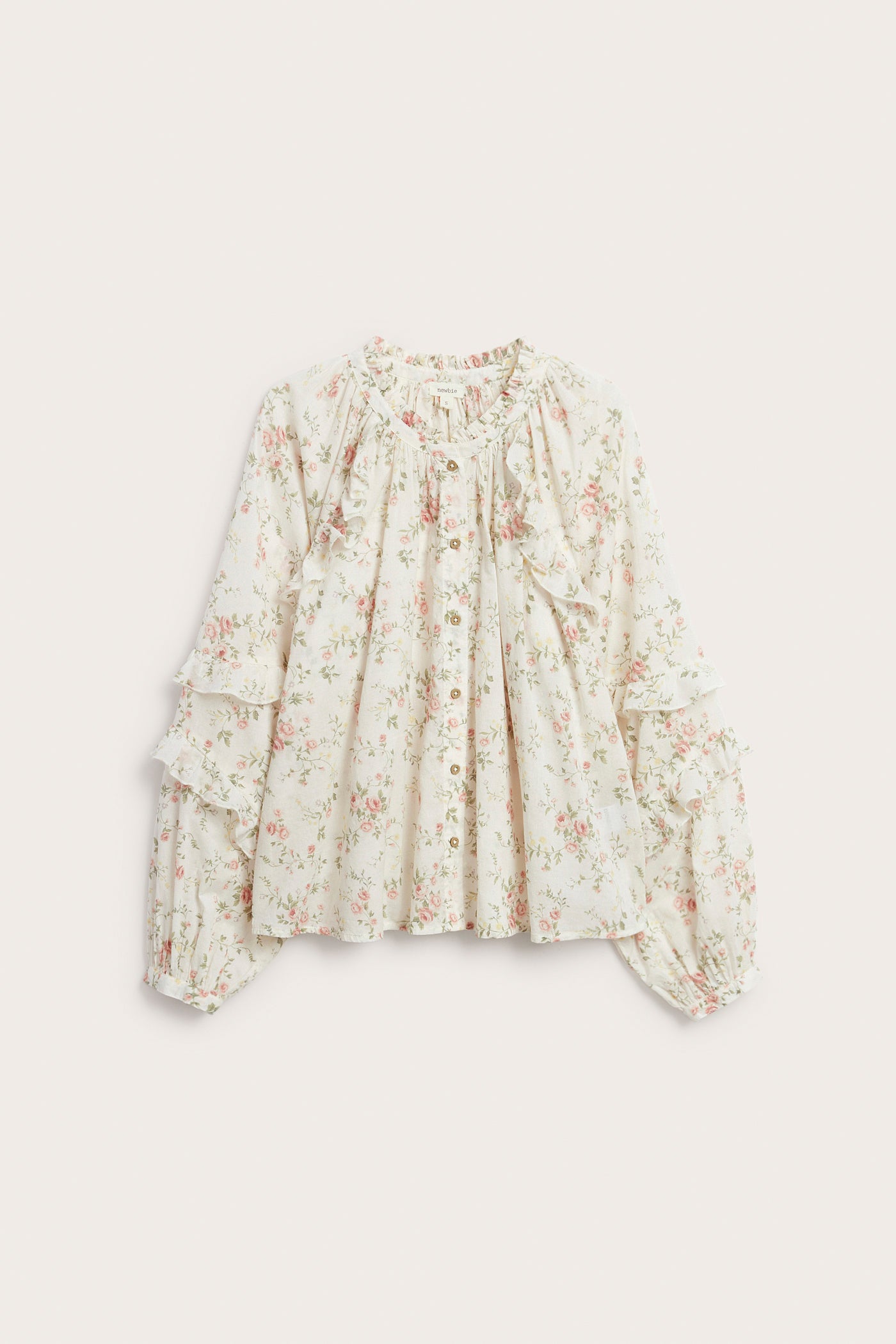 Women’s white floral blouse with frill