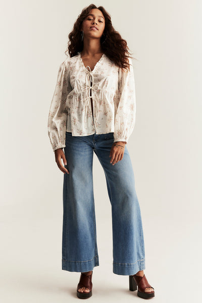 Women’s white floral blouse