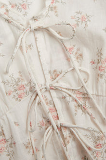 Women’s white floral blouse