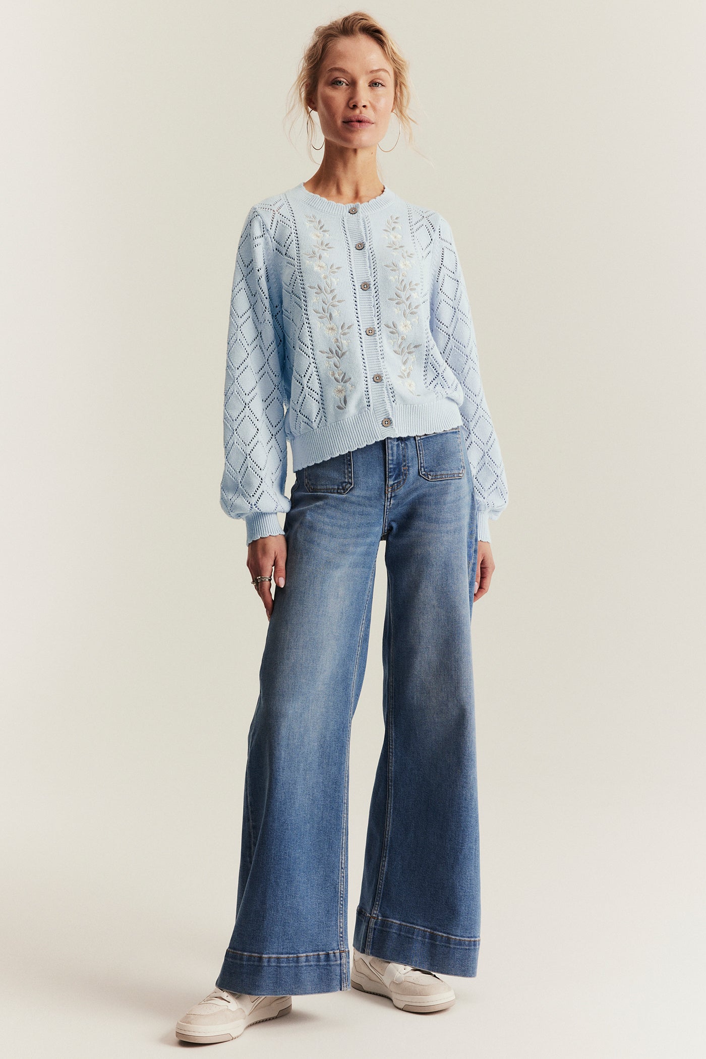 Women's blue knitted cardigan with flowers