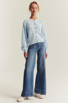 Women's blue knitted cardigan with flowers