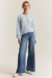 Women's blue knitted cardigan with flowers