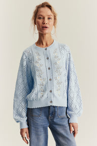 Women's blue knitted cardigan with flowers