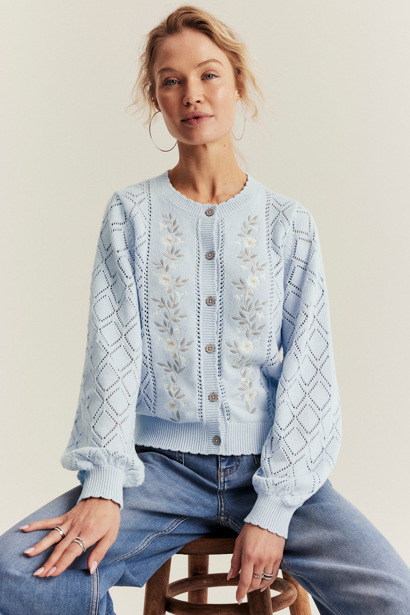 Women's blue knitted cardigan with flowers