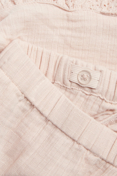 Kids pink woven shorts with frill