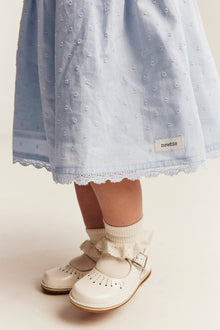 Baby blue dress with floral embroidery