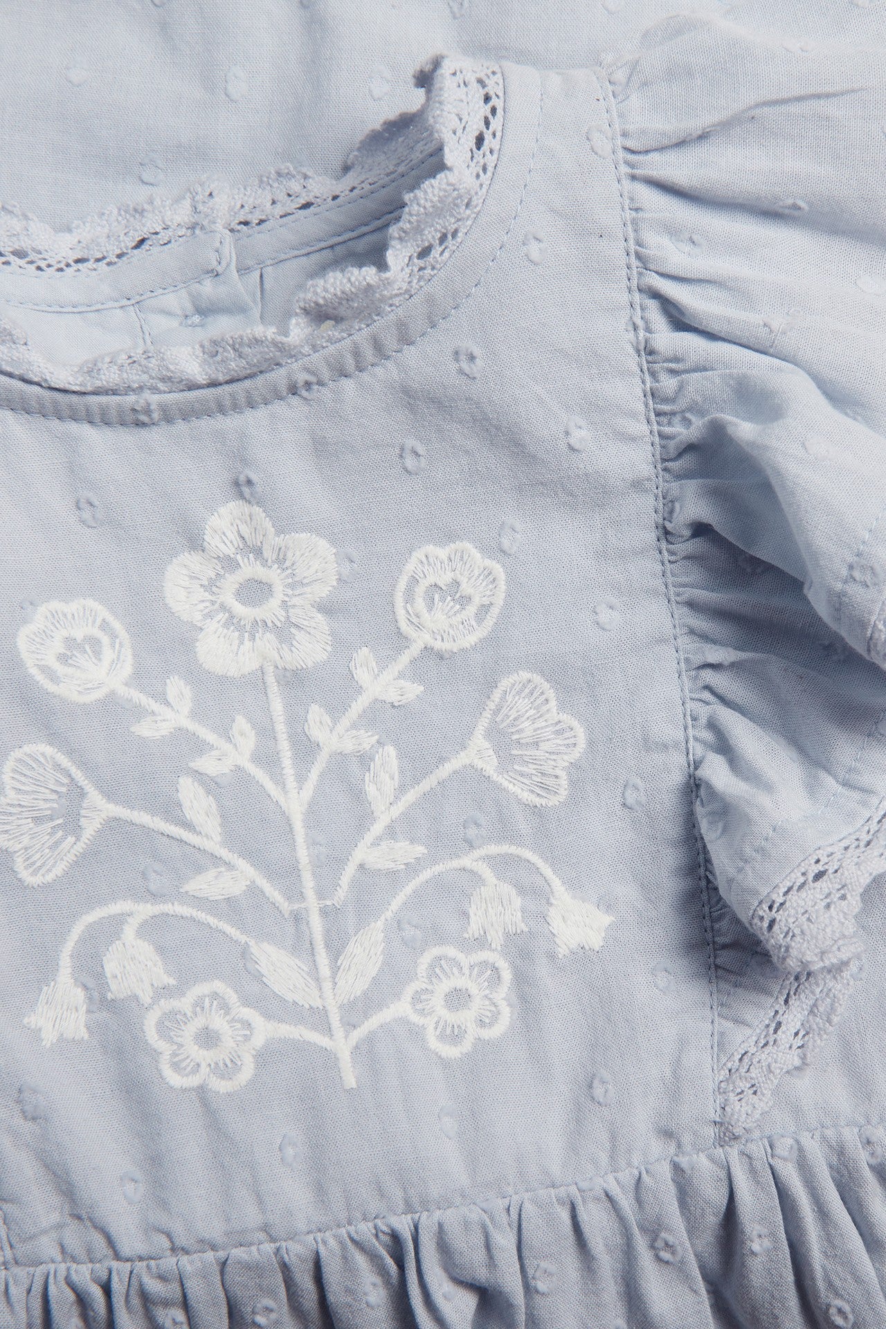 Baby blue dress with floral embroidery