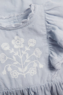 Baby blue dress with floral embroidery