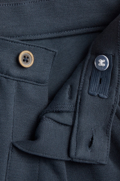 Kids blue trousers with button fastening