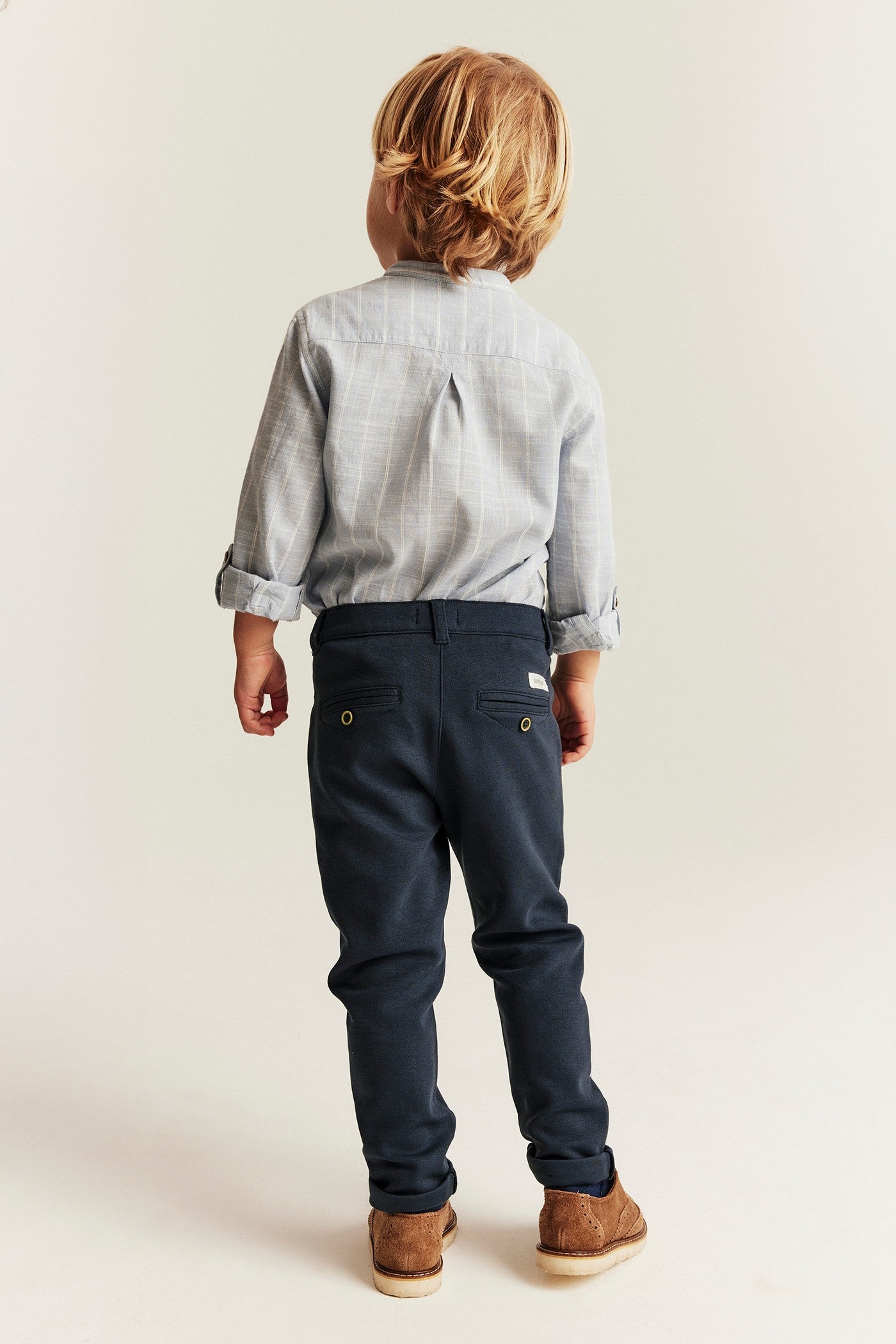Kids blue trousers with button fastening