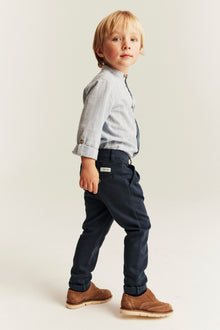 Kids blue trousers with button fastening