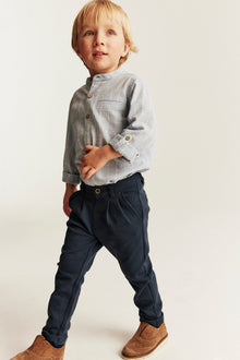 Kids blue trousers with button fastening