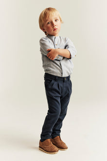 Kids blue trousers with button fastening