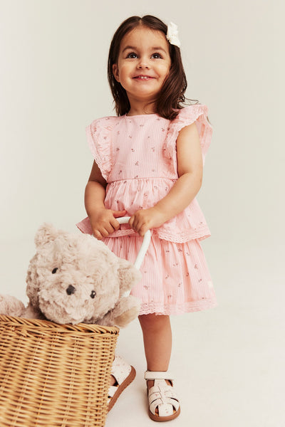 Baby pink floral dress with frill