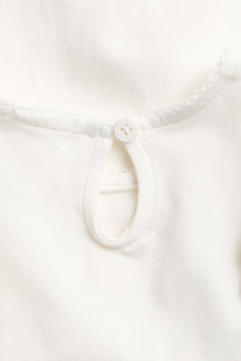 Baby white bodysuit with frills