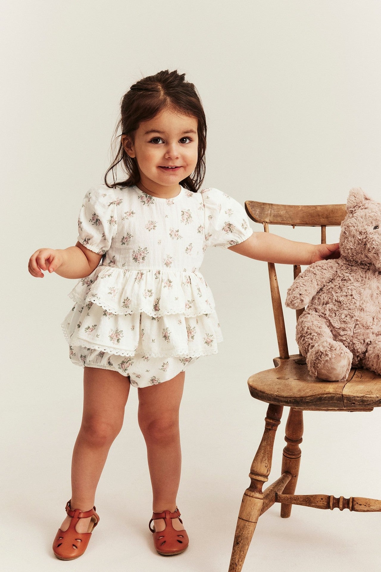 Baby floral romper with frill