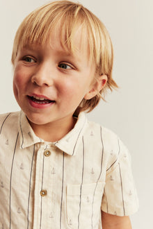 Kids cream shirt with sailboats