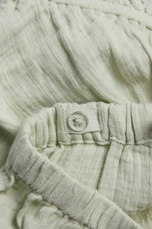 Baby green puff shorts with frill