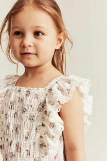 Kids floral jumpsuit with frills