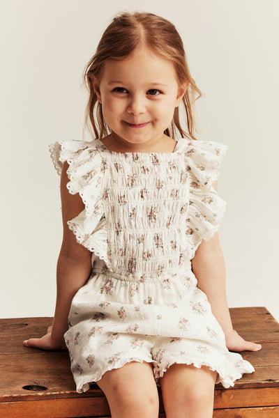 Kids floral jumpsuit with frills