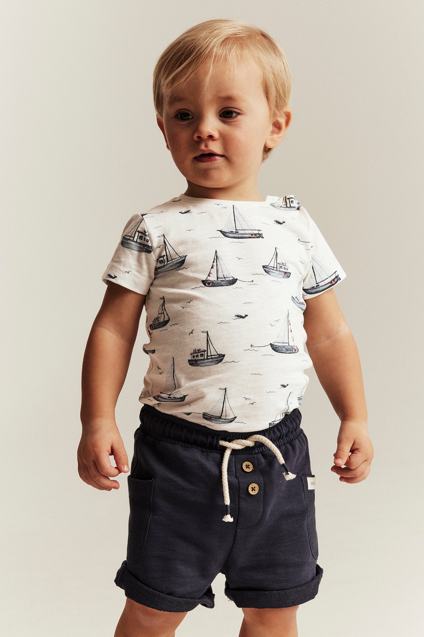Baby bodysuit with sailing boats