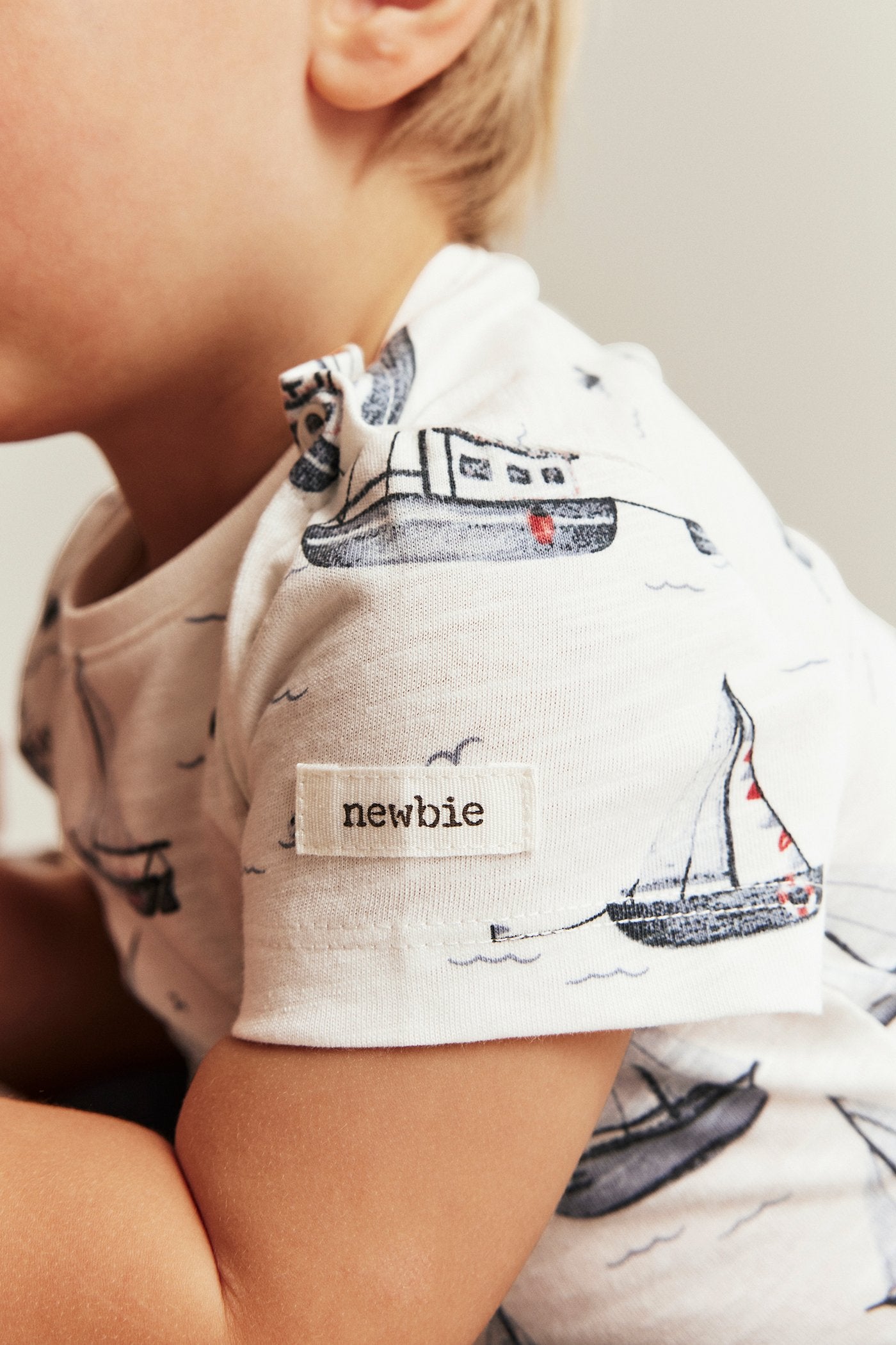 Baby bodysuit with sailing boats