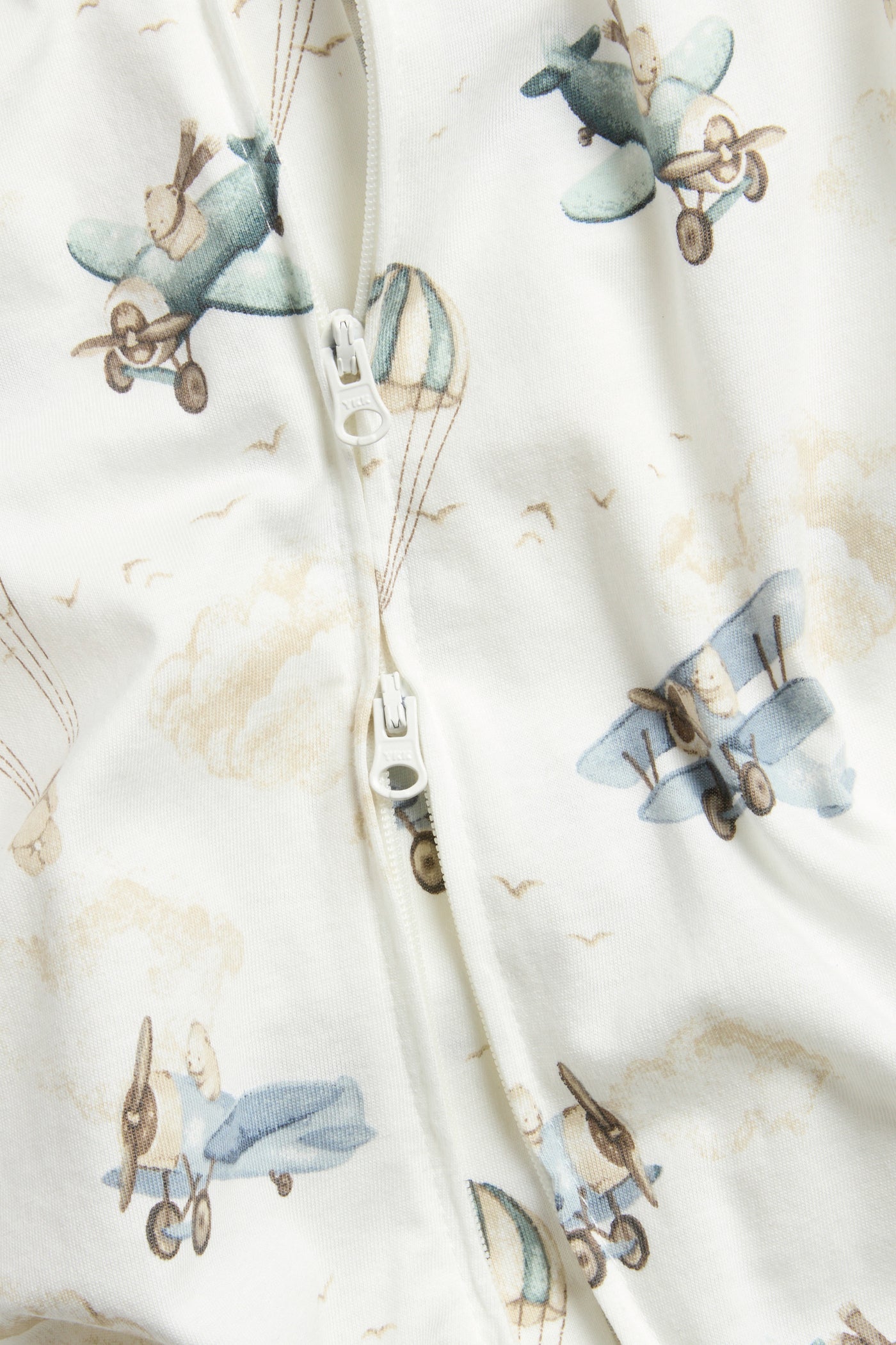 Baby white sleepsuit with hot air balloon print